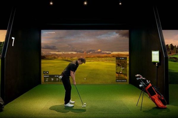A home theatre system plus an indoor golf course make the best entertainment experience.