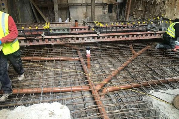 Using concrete piling and building a basement to make structures stronger