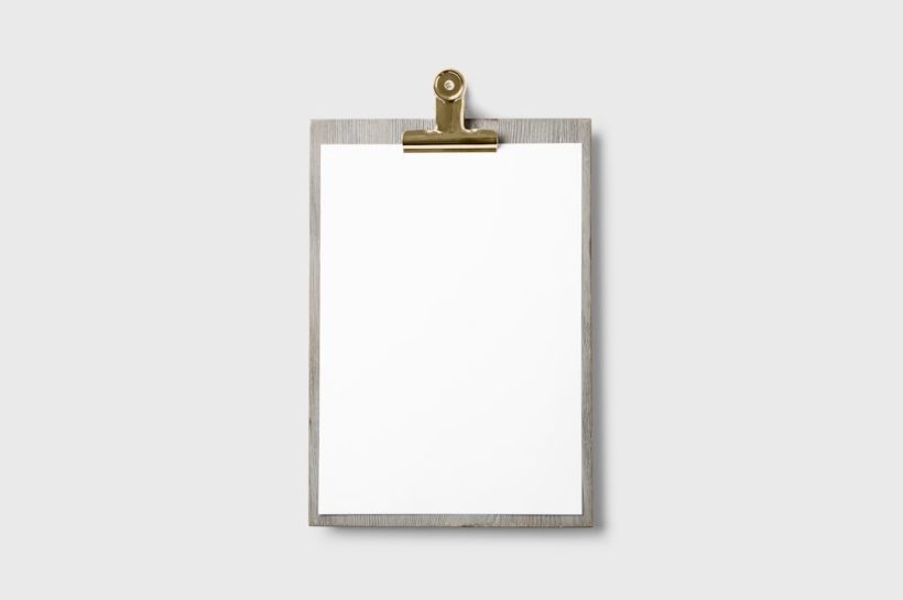 A blank clipboard on a gray background