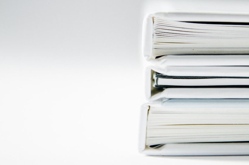 Stack of binders with blank spines